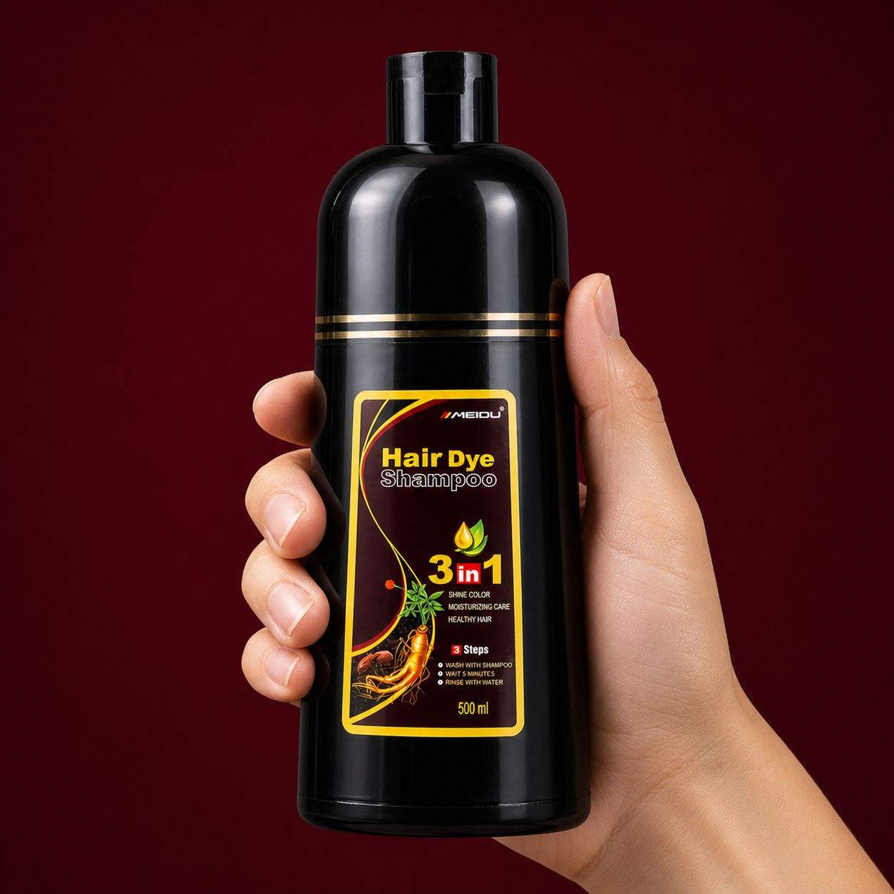 MEIDU 3-in-1 Hair Dye Shampoo bottle held in hand